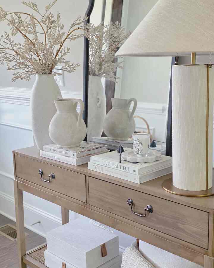 My favorite Diptyque candle is everywhere in my home 🤭
#entranceinterior #entryway #foyer #entrance #entrancemirror #candle #whiteinterior #beigeinterior #neutral