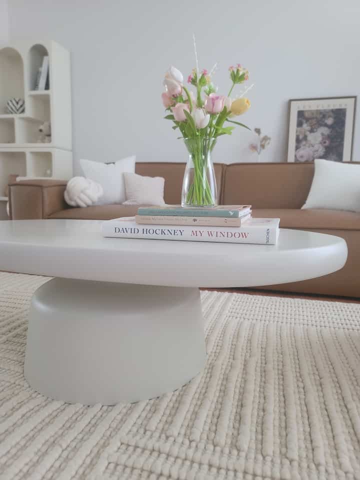 I’ve been slowly putting together this little shelf space, and it’s become one of my favorite corners at home. The white geometric shelf brings a nice modern touch, but it still feels playful with the addition of a limited- edition Snoopy plush that reminds me of childhood. I found this tiny handmade ceramic vase shaped like a rice ball—it’s simple but makes me smile every time I see it. The zebra print vase adds a bit of contrast without being too loud, and I’ve placed a few of my favorite art books there, too. It’s not perfectly styled, but it feels like me, and I love how each piece holds a little story.

#ShelfDecor #HomeStyling #CozyCorners #InteriorInspo #ArtLoverHome #EclecticStyle #MinimalVibes #CollectedHome #SnoopyCollector #HandmadeDecor #BookLoverStyle #VaseDecor #SoftAesthetic #PersonalSpace #Shelfie
