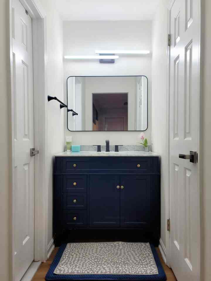 Designing for two boys with totally different styles—challenge accepted!
One vanity makes a bold statement in deep blue, while the other keeps things calm with cozy wood tones. Totally different vibes, but both feel just right for each of them.

#KidsBathroom #DesignForRealLife #BoldAndNeutral #InteriorInspo #HomeWithHeart