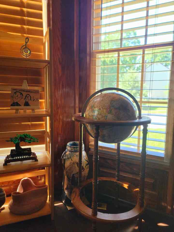 📚 This library room — or study, as we call it — is one part of the house we chose not to renovate. With its old wood panel walls and vintage charm, it felt right to leave it just the way it is.

The warm light, well-worn shelves, and small details like the globe and my son's handmade art make it a quiet, comforting corner of the home. It’s not fancy, but it has a lot of heart — and that’s enough.

#HomeLibrary #StudyRoom #WoodPaneling #QuietCorners #SimpleLiving #WarmSpaces #VintageFeel #OldHouseCharm