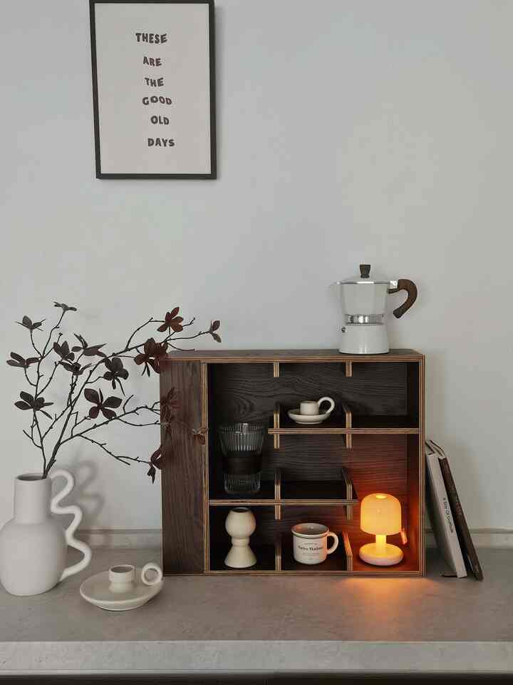 Long space next to the kitchen island table
I always wondered how to fill this space

I put a picture frame, a coffee machine,
I decorated it with IKEA items, and decorated it in various ways
But I always felt like it was 2% lacking, so I was never satisfied

Finally...completely...a space that perfectly suits my taste
I've been wanting the OF cup shelf
I won an event from a friend and got this! I did🤎

I opened it right away as soon as the delivery arrived and decorated it in a hurry
But is it real that it's this prettyㅠㅠI love it

#PrettyItemBest #콘수프기록 #오에프 #오에프컵선반 #컵선반 #화병 #촛대 #에스프레소잔 #커피용품 #모카포트 #미니조명 #무드등 #유리컵 #액자 #포스터 #월넛 #원목가구 #우드가구 #맞팔 #맞팔환영 #주방 #주방인테리어 #아일랜드식탁