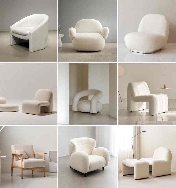 明るくナチュラルな色調の空間に、多様な白いブークレ素材の一人掛けアームチェアが配置された温かみのあるインテリア