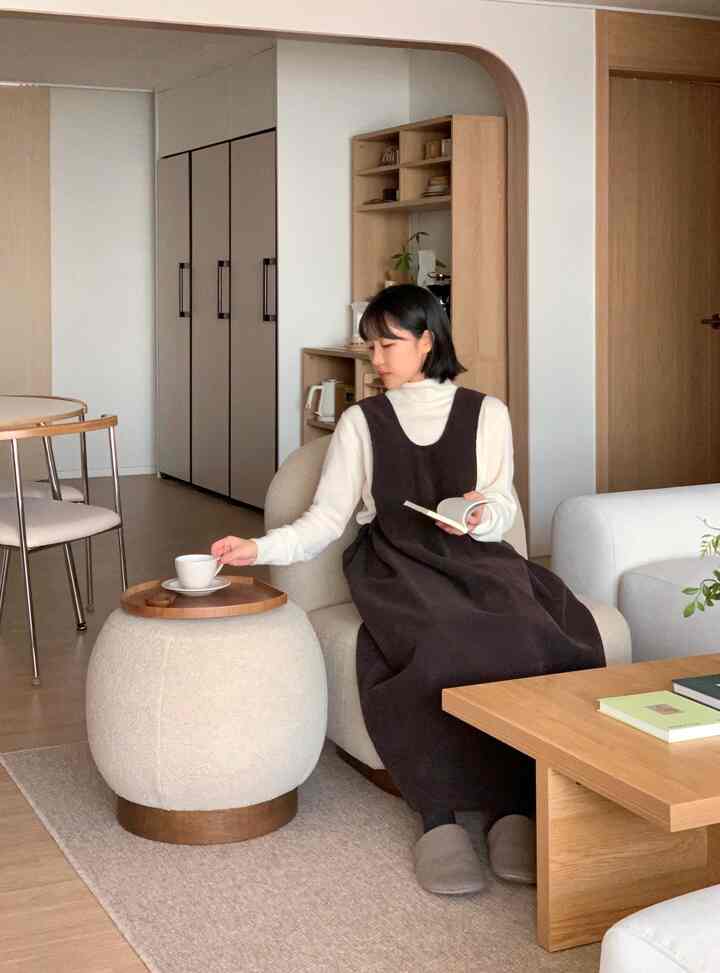Bright brown wood tones and beige hues in a living room featuring modern and natural atmosphere.