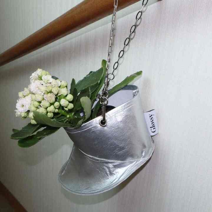 Silver boots pot cover