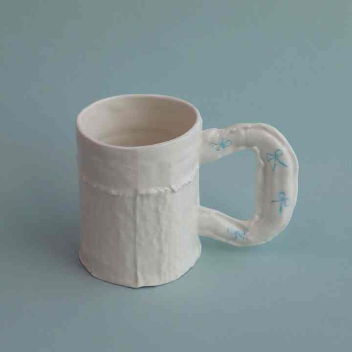 Tweed mug blue ribbons