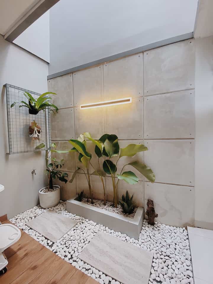 The small garden in our house is directly connected to the kitchen. What's the goal? It's as simple as so that the air when cooking can come out straight away and there is air circulation.

This small garden is still far from perfect, slowly after renovation we will try to add to the plant collection. What plants do you think are suitable for this semi-outdoor?

#japandihouse
#minigarden
#kitcheninspo
#tropicalhouse
#inspo
#backyard
#smallhouse