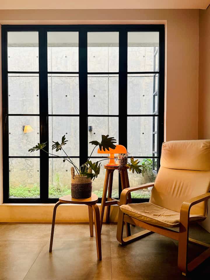 • LEISURE ROOM •
This is the night vibes in one of our favorite rooms, which we often use to relax while reading a book.
The large French door, which also provides access to the private backyard, is one of the points of interest in this room.
To make this room more aesthetic, we also chose to use furniture with shades of light oak and beige, combined with the monochrome feel of the room, making this room feel warmer and more comfortable 😁
Here I will share some of the items that I use in this entertainment room. Hopefully it's useful 😁

#homedeco #roomdeco #hobbyroon #entertainmentroom #scandinavianhouse #housetour #musicroom #scandinavian #roommakeover