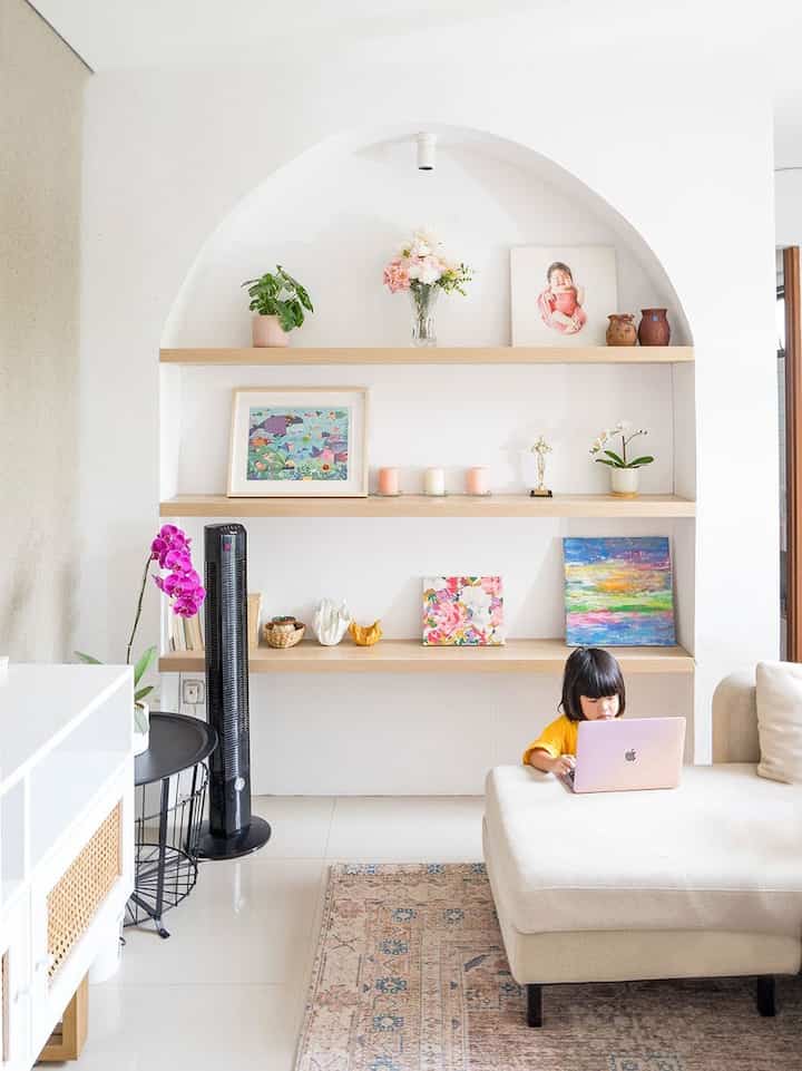 Our #livingroom is a serene Nordic oasis that is dominated by crisp whites, soothing greys, and delicate pinks. We started with a clean slate by opting for white walls and white cream sofa to create a sense of spaciousness.

Natural textures like light wood and cozy textiles evoke a warm and inviting atmosphere. We also embrace the abundance or natural light streaming in through large windoes by keeping window treatments light and airy. 

We complete the Nordic look with botanical touches, such as potted plants, to bring a hint of nature indoors. The result shows a harmonious blend of Scandinavian minimalism and cozy sophistication, perfect for basking in the glow of natural light.

#Nordic
#Scandinavian
#homedecorinspo
#roomdecorinspo
#livingroomidea 
#rumahestetik