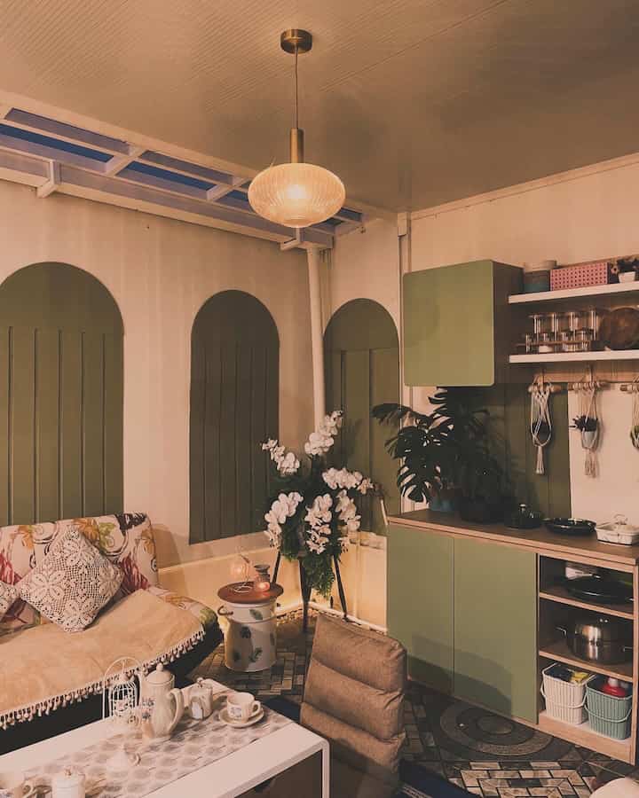 Permainan lighting di rumah kami adalah dominan warm-white untuk lampu-lampu strip dan white untuk lampu-lampu downlight. Lampu-lampu strip kami pasang di sela-sela headboard, area dinding dapur yg lebar agar menyorot ke arah Arch, dan disela-sela mini garden agar menambah kesan estetik. Namun yang paling kami harapkan adalah lighting alami yakni cahaya matahari. Dikarenakan design bangunan utama belum ada perubahan dari developer perumahan, rumah kami hanya memiliki jendela-jendela yg kecil. Oleh sebab itu, saat menambah kanopi dapur, kami segaja menyisahkan sedikit atap terbuka untuk cahaya masuk. Sangat lega saat beraktifitas di area yang terang bermandikan cahaya matahari. Walaupun kami sedang tidak keluar rumah, tapi kami tetap bisa menikmati cahaya matahari pagi-petang yang berlimpah dan juga bisa memandang langit sambil berbaring santai di sofa. 
#HomeLighting #InspirasiLampu #Lampurumah #homegarden #openspacekitchen
