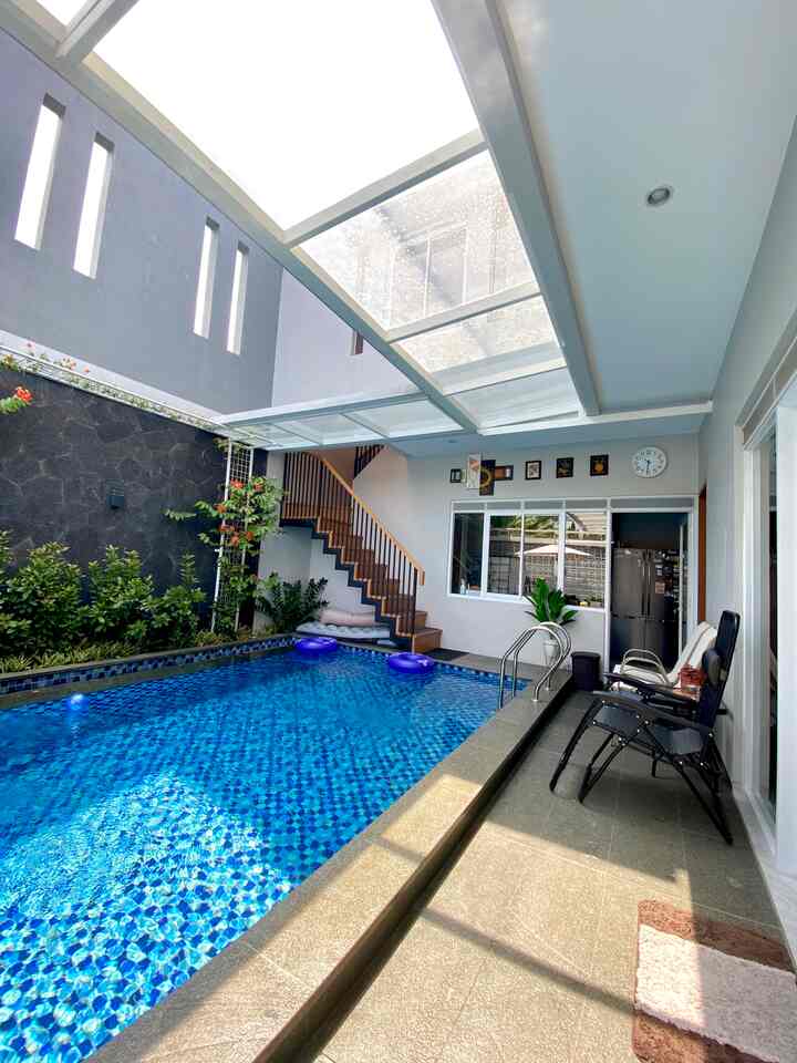 The first time I saw the concept of this house, I immediately fell in love. The house is open space with large windows in each room, which allows abundant light to enter the house.
Another favorite thing is the swimming pool area which connects to the kitchen, so I can still monitor the activities of the children playing even though I'm in the kitchen.

#KidsFriendlyHome
#ChildFriendlyHome
#FamilyFriendlyDesign
#MinimalistHome
#HouseAndPool