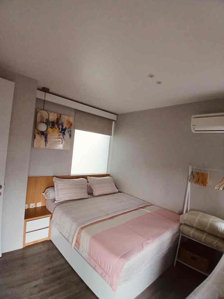 #depok #kamartidur #japandi #japanese #rumahcluster #rumahkecil #minimalis If you usually take photos of this room with dim lights, this time I'll try to show it photo of the room using natural lighting in the morning when it has just been tidied up. It's true that basically my house has a cool tone, but the wooden interior and pink bed sheets help make the room more balanced