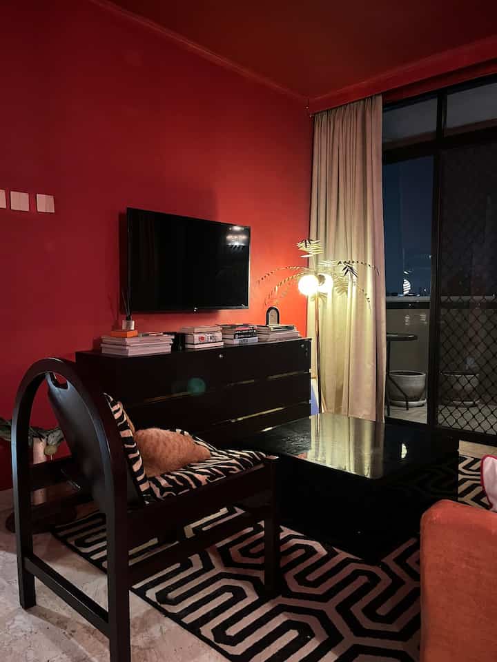 After a long time, I finally bought an accent chair for this living room ❤️

Initially I thought a 3 seater sofa with a backrest that could be sat on was enough, but because I like inviting friends to hang out at home it turns out there is still space in the living room for chairs. I made this chair custom by craftsmen in Jepara.

Even though there are lots of different motifs in this living room, I think choosing neutral colors creates a coherent theme. The animal print motif repeats the accent on the sofa cushions, while the monochrome color matches the motif on the carpet without creating an overly busy effect from the collision of these two motifs.

#livingroomideas #maximalisthome #ruangtamu #inspirasiruangtamu #Apartemen #interiormodern