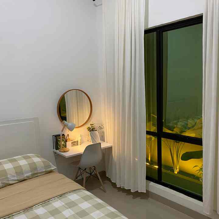 White and beige toned 4.5 tatami bedroom featuring wall-mounted desk and round mirror in a cozy setting