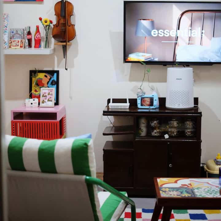 Our family room is not very big, but we are very comfortable in it. The cabinet under the TV that we have is a relic from our grandmother which is called antique furniture.
The table I use is a custom teak wood table with Soeryo tiles because it combines with the stairs in my house.

As a graphic designer, I really like things that are colorful. So I combine antique furniture with colorful ones. I choose a house concept that suits my preferences and my personality, I don't need something expensive and tired when I see other people's houses that are nicer and look more expensive.

For me, a house is enough according to my budget so that there is no impression of being forced to buy something that I feel is not necessary. The point is that having a clean and tidy house makes me comfortable in it. The house grows with its owner too.

Warm greetings from your new neighbors :)
@rumahkitaberwarna

#homedecor #interiorrumah #livingroom #antikmodern #tesammans