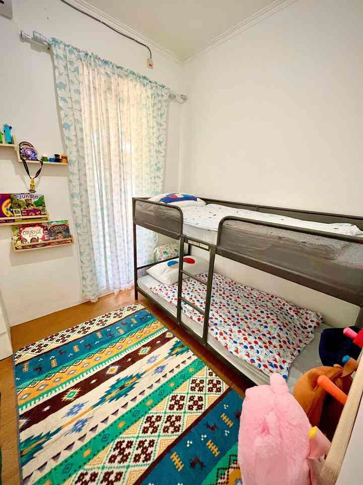 We are Parents with 2 kids with a room that is not very large, there are several tricks that we apply to keep the child's room comfortable, functional and attractive...
1. Using a bunk bed, because we have 2 children who are still toddlers and sleep in one room with a bunk bed so the room isn't stuffy or full, the kids also have fun because climbing the stairs on the bed is fun for them.

2. Use a bookshelf attached to the wall. In this way, the books remain neat and the room with minimal furniture remains spacious.

3. For children's wardrobes, we put 1 drawer with 5 drawers. And put it in the corner of the room.

4. We declutter children's clothes and children's toys regularly. So that everything must be enough in the space provided. 

5. In front of our child's bedroom door there is a basket of toys and a painting made by my husband who was inspired by our holiday trip from Bali in 2022.

Those are our tips for small children's rooms... I hope they are useful 

#TinyChildren's Room
#KidsBedRoom
#KidsBedRoomInspo
#BedRoomStyling
#Children's RoomDecoration