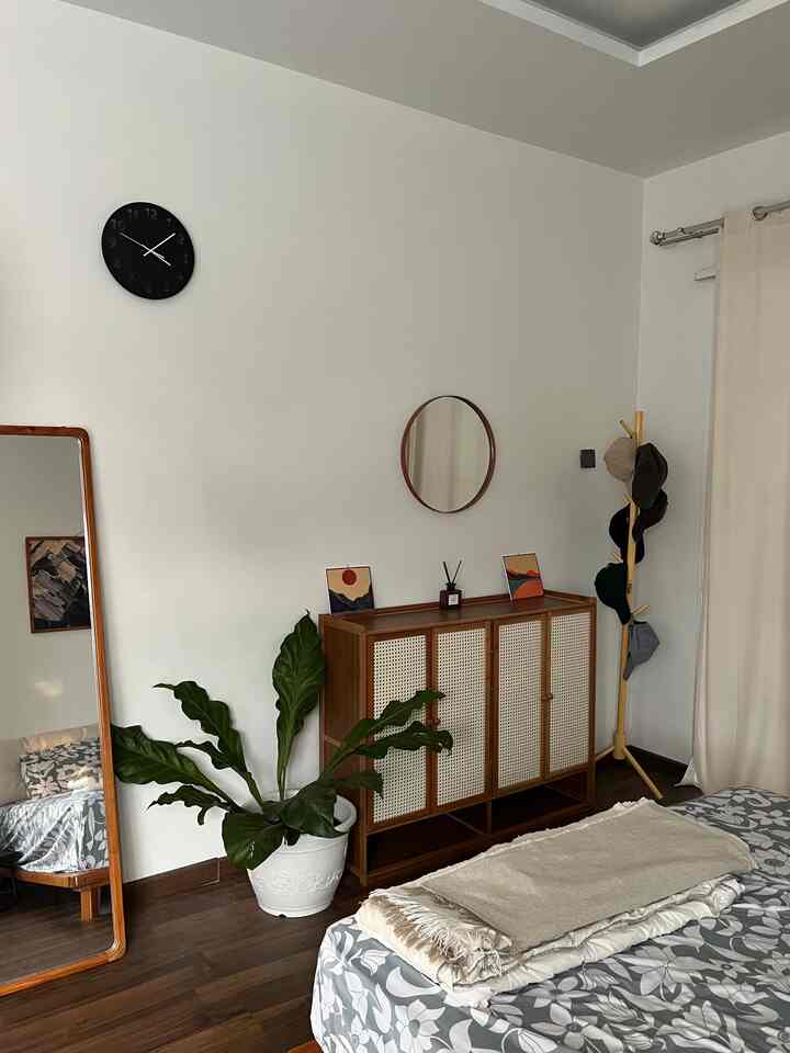 It took months for me to build and design my dream room. 

Pada proses pembangunan kamar ini, terdapat berbagai perubahan layout serta tata letak terutama pada posisi dan ukuran jendela kamar. Tidak cukup sampai disana, penempatan furnitur pun mengalami perombakan hingga beberapa kali. Setelah melalui banyak trial and error, saya cukup pede untuk mengatakan bahwa saya berhasil mewujudkan kamar impian saya; kamar dengan gaya scandinavian dipadupadankan dengan gaya japandi dengan pencahayan alami yang baik. Hal tersebut tercermin dengan pemilihan berbagai furnitur dengan aksen kayu, ditambah dengan tanaman-tanaman hias yang menambahkan warna pada ruangan. 

Dalam pemilihan furnitur, saya banyak mengambil inspirasi pada rumah-rumah yang saya temukan di Jepang. Selain itu, saya juga cukup terinspirasi dengan seorang Youtuber—BenjiPlant yang banyak memberikan rekomendasi atas tanaman-tanaman yang baik untuk diletakkan dalam ruangan.

Selama perjalanan membangun kamar ini, saya banyak mendapatkan komentar dari orang sekitar akan apa yang harus saya lakukan terhadap kamar saya. But i always say no. Menurut saya, penting bagi diri kita untuk bertahan dengan keiingininan pribadi dan menjadi otentik. Karena ruangan yang diciptakan dan didesign secara jujur, akan selalu menjadi kamar yang paling nyaman.

#MyDreamRoom
#IdeDekorKost
#KostEstetik
#Scandinavian
#Japandi
#Bogor