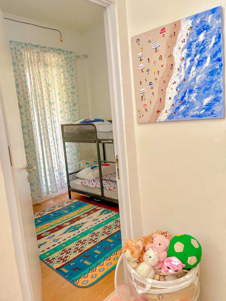 Kami memiliki 2 anak dan saat ini kamar anak kami hanya 1, kami siasati dengan menempatkan kasur tingkat seperti ini, karena lebih hemat space pada ruangan dan anak anak juga suka karena mereka bisa memanjat dan itu seru menurut mereka.

Kami juga dekorasi dengan item item kesukaan mereka dan palet warna ruangan yang colourful. Seperti gorden dinosaurus, penempatan mainan, dan juga meja multifungsi yang bisa dijadikan meja belajar, meja lego dan meja montessori ataupun memancing.

Karena ruangan tidak begitu besar untuk buku buku diletakkan pada rak buku yang menempel di dinding. 

#TempatTidurAnak #KamarTidurAnak #KasurTingkat #BunkBed #RumahRamahAnak #DekorasiKamarAnak #SatuKamarDuaAnak #TipsKamarAnak #InspirasiKamarAnak