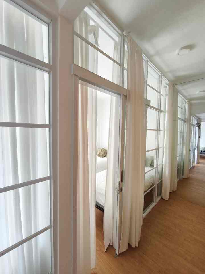 Let's go into the master bedroom at Tentramhome,

The beds are twin but if necessary, they can be combined into 1 large bed

The color palette is chosen to be neutral to be calming. The decor is also minimal so that it doesn't look messy. The furniture chosen is small but still functional so that it is not stuffy and looks spacious and comfortable

Don't forget, some important points that are also considered: clean, bright, and not damp.

#Curtain #WallShelf #Pillow #Duvet #Quilt #NightLamp #DeskMirror #ClothHanger #FoldableBedFrame #Bed
#BedroomStyling
#MakeOverKamarTidur