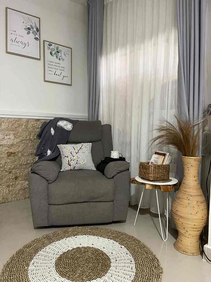 This is where time slows down—relax with your favorite book and a warm cup of tea. 

#MyHouseInspiration #ReclinerSofa #BohemianStyle #MyReadingCorner #PetiteRoomVibes