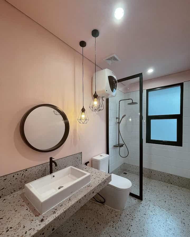 - bathroom -

Hello Ohouse friends!

Thanks for stopping by at rumah_veyla,,
I want to tell you a little about the bathroom in our house,,
The size of this bathroom is 1.8x3.3m
When making this bathroom, I changed the concept a few times, until finally I fell in love with the combination of calm salem paint and Terrazo
So that it's not too feminine, there are touches of black in several bathroom equipment items
What do you think Ohouse friends?
Salem meets item, is it suitable?

#sink #cermin #toilet #shower #lantaiterrazo #catkamarmandi #keranhitam #lampugantung #kamarmandi #KamarMandiMinimalis #InspirasiKamarMandi