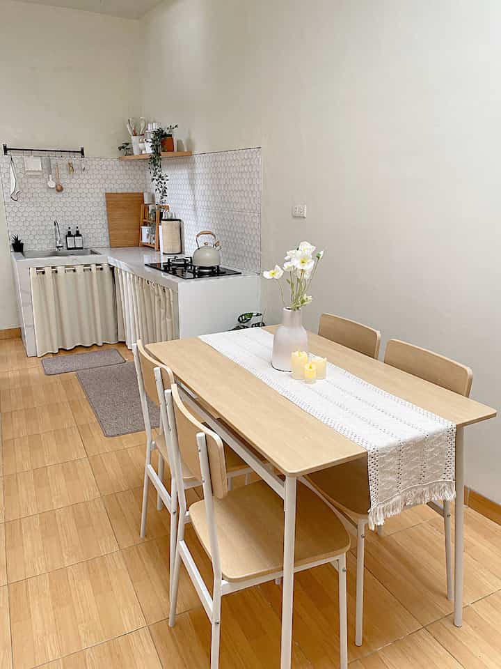 Because the kitchen at home is built on limited land, we also use our dining room here. This dining room is right next to the kitchen. For the dining table, we deliberately chose one that suits our kitchen needs, a minimalist dining table. For the kitchen layout, there are deliberately not too many shelves/items so that it still looks spacious and not messy.

#Inspiration for a Small Kitchen #DapurCompact #MejaMakanMinimalis #TableRunnerNordic #GordenKolongWaterproof #KitchenMat #CatTembokAvian

