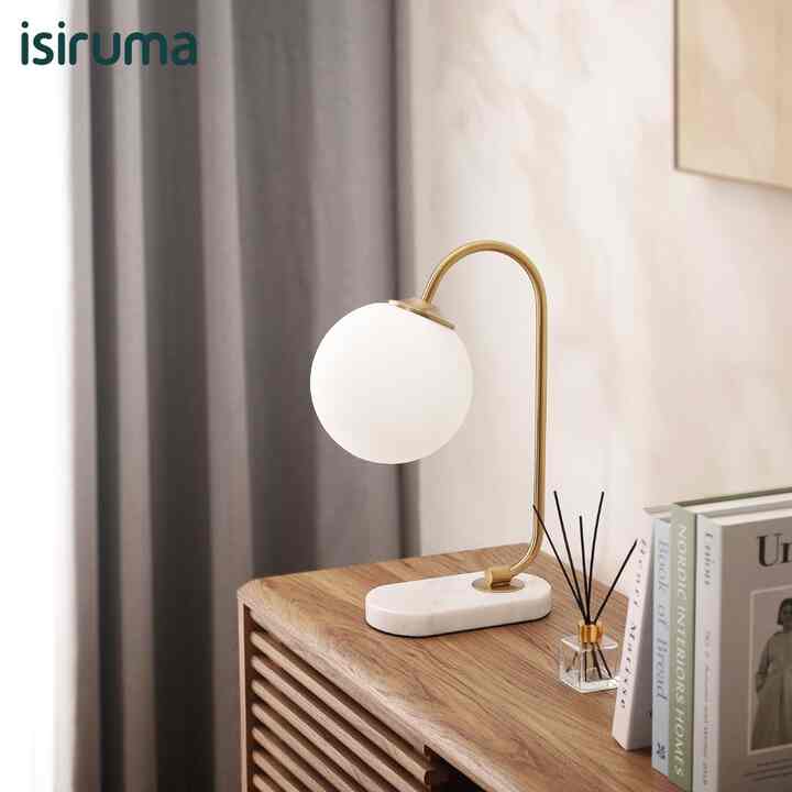 Lampu menjadi salah satu sumber daya yang dibutuhkan semua kalangan masyarakat saat ini, setiap jenis lampu selalu memiliki gaya keunikan dan fungsinya masing-masing.  

ISIRUMA menghadirkan produk terbaru yang dapat menemani hari-hari anda menjadi lebih berkesan. 

BLOSSOM Table Lamp menjadi salah satu varian kategori lampu hias / meja / tidur yang memiliki desain unik serta minimalis sehingga mudah ditempatkan dimanapun kebutuhan ruangan anda.   

Spesifikasi :  
Dimension Product : 12 x 28 x 44 cm 
Dimension Packing : 50 x 30 x 27 cm 
Gross Weight : 3.2 kg 
Packaging Type : Standard Packaging 
Material : Metal, Glass, Marble Bronze, Milky White, White Base, Lamp holder E27*1pc   

BLOSSOM Table Lamp memiliki kapasitas daya sampai dengan 40watt, sehingga untuk kebutuhan penerangan cahaya dapat disesuaikan dengan luas dan bentuk ruangan anda. 

Terbuat dari bahan metal berkualitas yang dilapisi dengan coating spray berwarna emas, frame polypropylene putih dan base keramik marmer yang meninggalkan kesan mewah diruangan anda.  

Note : Produk ini menggunakan fitting bohlam tipe E27 dan belum termasuk bohlam didalam kemasannya.

#lampumeja #lampuruangtamu #lamputidur #lampu #isiruma