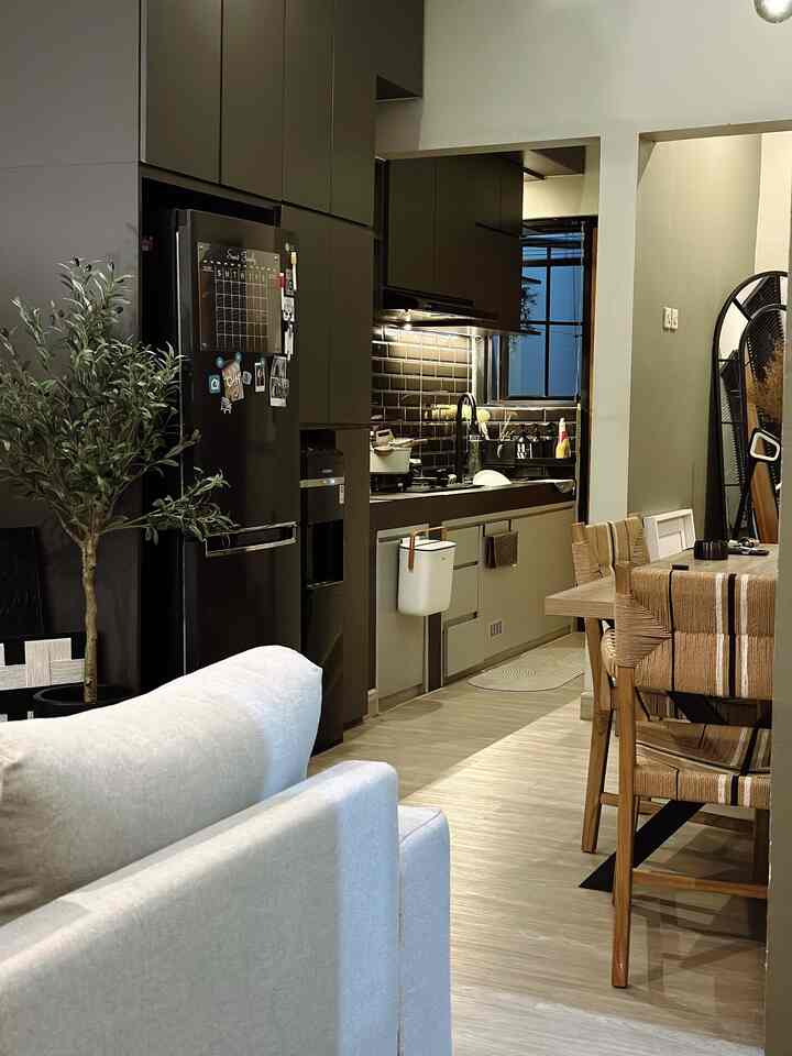 Gray and wood tone kitchen and dining space featuring modern, compact storage ideas with a clean and functional interior
