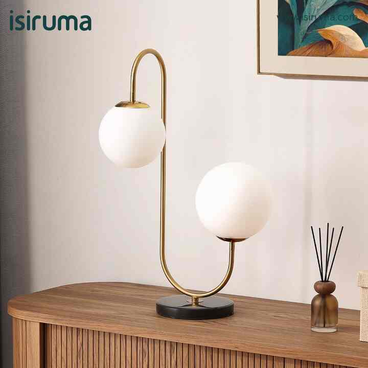 Lampu menjadi salah satu sumber daya yang dibutuhkan semua kalangan masyarakat saat ini, setiap jenis lampu selalu memiliki gaya keunikan dan fungsinya masing-masing.  

ISIRUMA menghadirkan produk terbaru yang dapat menemani hari-hari anda menjadi lebih berkesan. 

DELICE Table Lamp menjadi salah satu varian kategori lampu hias / meja / tidur yang memiliki desain unik serta minimalis sehingga mudah ditempatkan dimanapun kebutuhan ruangan anda.  

Spesifikasi :  
- Dimension Product : 35 x 18 x 60 cm 
- Dimension Packing : 32x 32 x 66 cm 
- Gross Weight : 4 Kg 
- Material : Metal, Glass, Marble Bronze, Milky White, Black Base, Lamp Holder E27*2Pcs  

DELICE Table Lamp memiliki kapasitas daya sampai dengan 40watt, sehingga untuk kebutuhan penerangan cahaya dapat disesuaikan dengan luas dan bentuk ruangan anda. 

Terbuat dari bahan metal berkualitas yang dilapisi dengan coating spray berwarna emas, frame polypropylene putih, dan base kramik marmer yang meninggalkan kesan mewah diruangan anda.  

Note : Produk ini menggunakan fitting bohlam tipe E27 dan belum termasuk bohlam didalam kemasannya.

#lampu #lampumeja #lampuruangtamu #lamputidur #isiruma