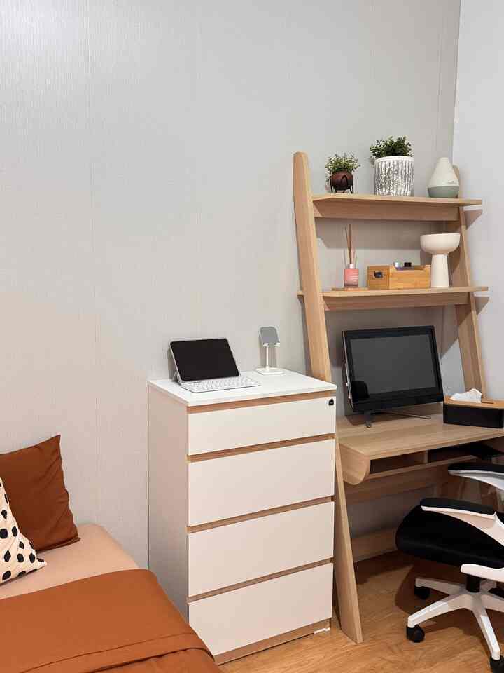 Natural white and brown toned 6-tatami bedroom with a home office setup featuring desk and chest of drawers in a neat layout