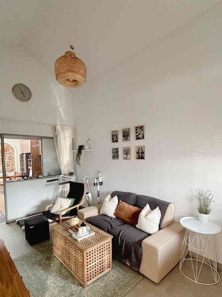 White and natural tone 5x3m living room with beige sofa and rattan pendant light, featuring a minimalist and airy atmosphere