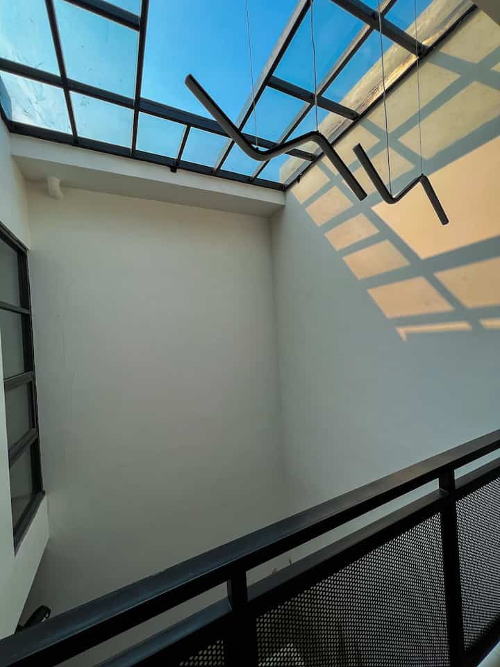 Back balcony, an underrated relaxing spot! Bright during the day, cool in the evening, and a place to catch some wind at night. Plus a skylight that makes the house even more naturally bright. What else is missing? Hehehe  #SkylightGoals #SantaiDulu #BalkonBelakang #SkylightVibes #RumahAesthetic #SantaiDulu #CahayaAlami #CozySpace #MinimalistDesign #GoldenHourVibes #RumahNyaman #ViewAsik