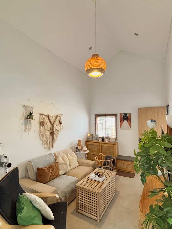 Living room 5 meters, initially this living room was still empty, we only had a folding mattress that could be a sofa and a carpet, finally we started to fill this living room with some decorations. starting from the sofa, TV table, shoe cabinet, and continued to fill the decorations. 

to fill this mini living room, you really need to choose from materials and colors following the natural theme of this house. 

hopefully inspiring🩵

#shoe cabinet #raksepatu #lampugantung #lampugantungbambu #cattemboklivingroom #mejalivingroom #mejastorage #DekorasiEstetik #SmallDecorItems #DecorativeItems #livingroominspo #livingroominspiration #livingrooms #sofakivik #sofaduadudukan #granitlantai #granitmatte #dekorasilivingroom