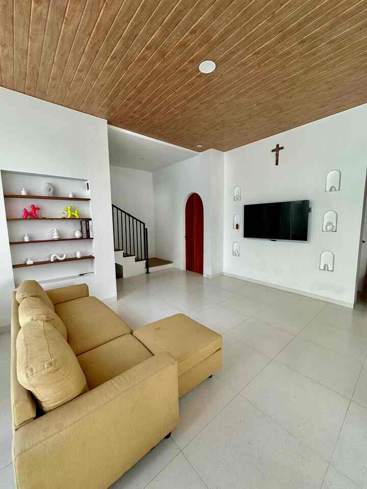 Pelan-pelan tapi pasti, living room di Nuestra Casa mulai kelihatan bentuknya 😍✨
Meja TV masih OTW (PO-nya sih kayaknya sekalian nanem kayunya dulu 😅), tapi sofa udah nangkring manis dan ceiling kayu bikin vibes-nya auto cozy 

Buat yang lagi nyusun living room biar nyaman dan estetik, ini beberapa hal yang aku terapin:
✨ Pilih sofa yang empuk tapi warnanya netral biar gampang dipaduin
✨ Tambah elemen kayu (kayak ceiling ini) buat kesan hangat ala vila
✨ Mainin dekor simpel dan built-in, supaya tetap clean tapi nggak kosong
✨ Pencahayaan alami juga penting banget, bikin ruang berasa lega & adem

Rumah ini memang bukan di Bali, tapi vibes-nya nggak kalah sama vila 
Karena buat kami, rumah bukan cuma tempat tinggal, tapi tempat healing yang bisa dinikmati setiap hari.
Nggak harus nunggu liburan… cukup pulang ke Nuestra Casa ❤️

#sofaminimalis #plafonpvc #vaseaesthetic #vasestetik #vasscandinavian #dummybook #stylingruangtamu #dekorasilivingroom #inspirasilivingroom