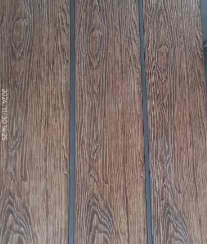 Papan pagar motif kayu