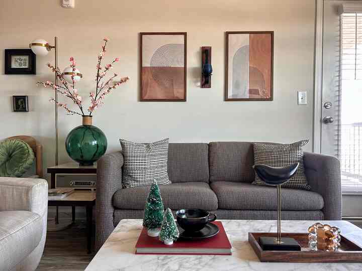 #midcenturymodern #neutralspaces #transitional #timelessrooms #asian I like the look of all of this that I’ve done to this room but i think i may experiment by replacing those boho geometric prints with an original artwork that I’ve yet to paint. I have an idea. I think my original art painting idea will fit the vibe of the window wall that is shown in the second pic.