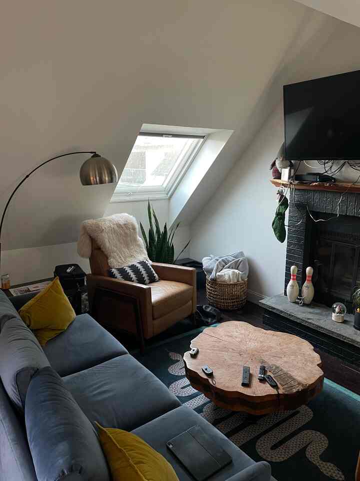 Another skylight in the living room + the fireplace = cozy-ness #livingroom #livingroominterior #fireplace