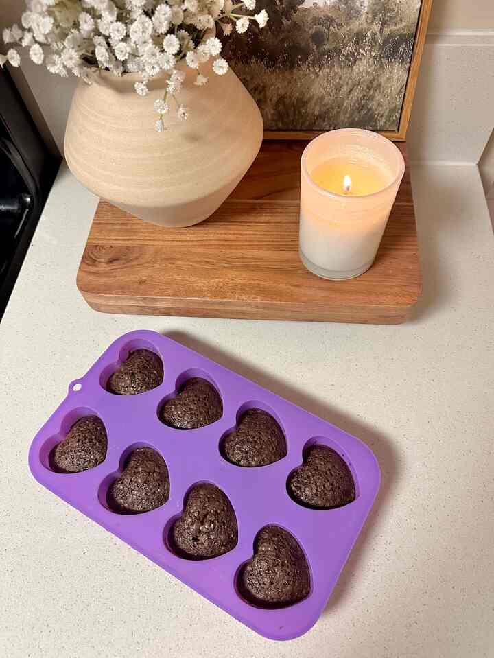 Baked heart shaped brownies for valentines day in thia cute silicone mold! #baking #cooking #brownies #candle 