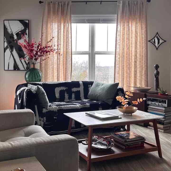 I love this room. I love the coffee table but i wish i had a round one or a smaller square one that is less than 38” long. #contemporary #sofa #couch #slipcover #coffeetable #decoration 
