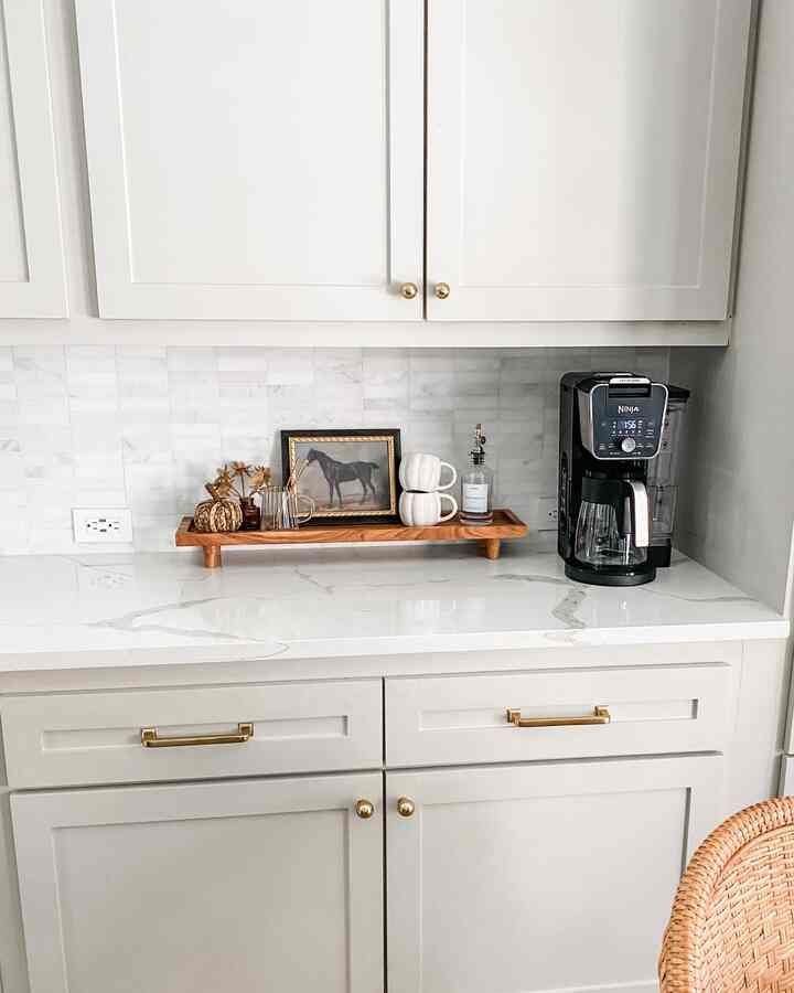 Simple and functional coffee bar styling! 


#coffeebar #coffeemaker #syrupdispenser #fallcoffeebar 