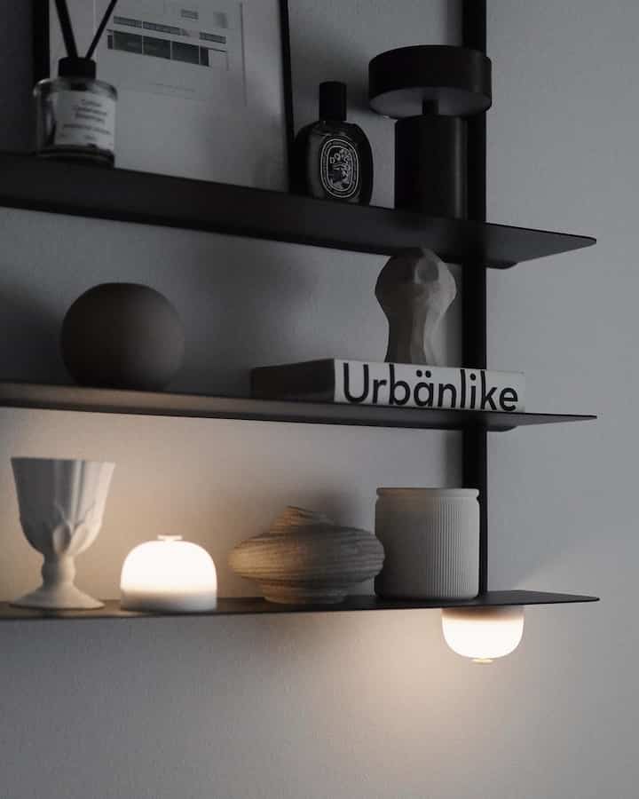 
another shelves on the second floor living room. 

#shelf #shelfinterior #shelfdecoration #shelfie #lamp #vase #candle #book #gobletcup #poster #posterframe #diffuser #AudoCophenhagen #Diptyque #perfume #Gejst #Nivo 