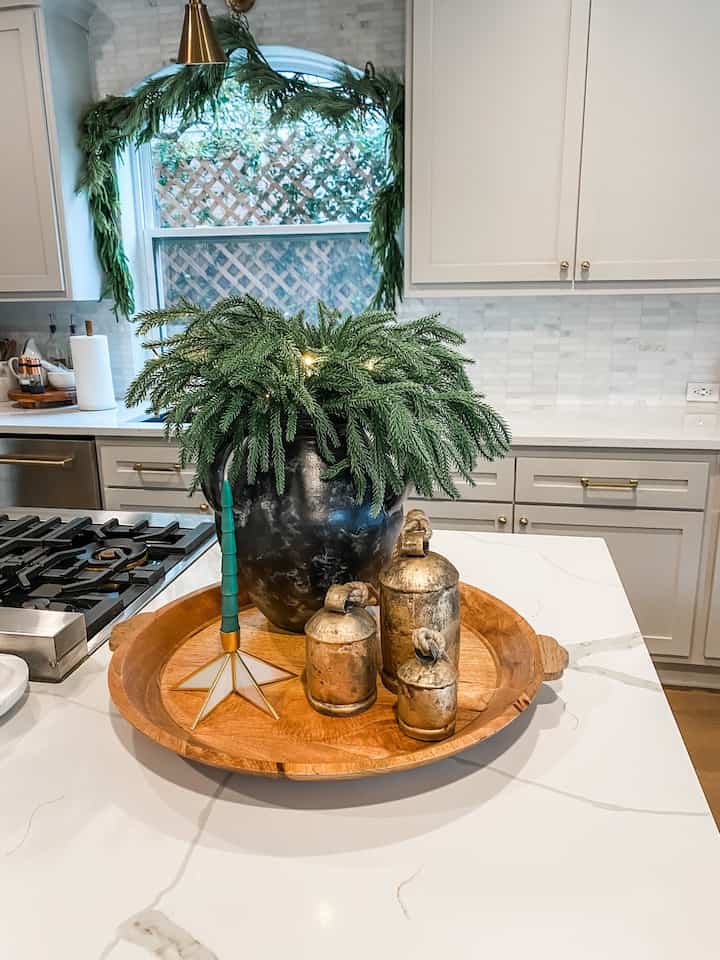 Kitchen island styling for christmas! #christmasdecor #christmasstyling #centerpiece  