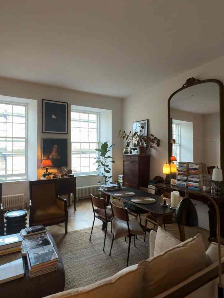 Natural wood tones with classic furniture in an Art Deco style living room space