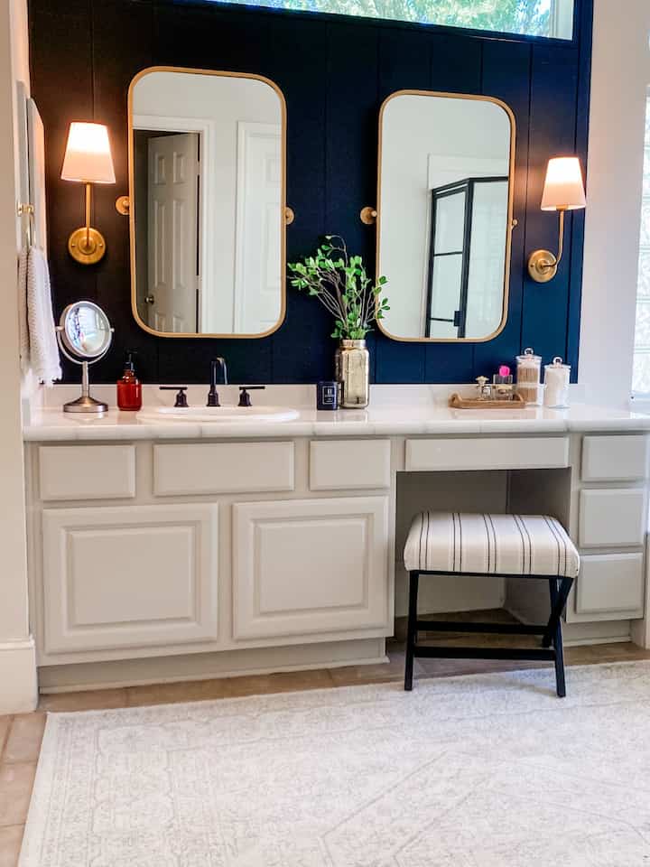Primary bath styling: blacm shiplap wall with painted counters and caninets! #bathroommakeover 