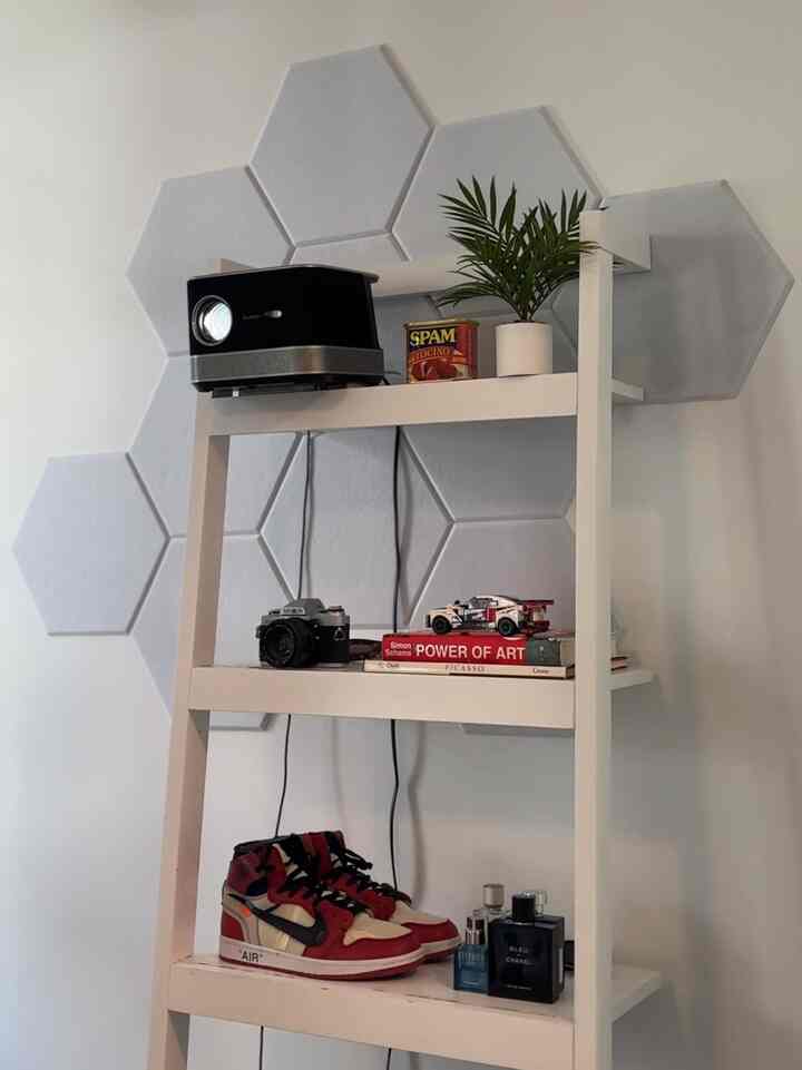 I am a huge fan of ladder shelves- easy way to set up a cool display in my midcentury modern home !! #minimalinterior #laddershelf #projector 