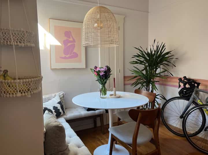 dining table and bench set up on my postmodern studio apartment #diningnook #smallspacehacks #apartmentinspo