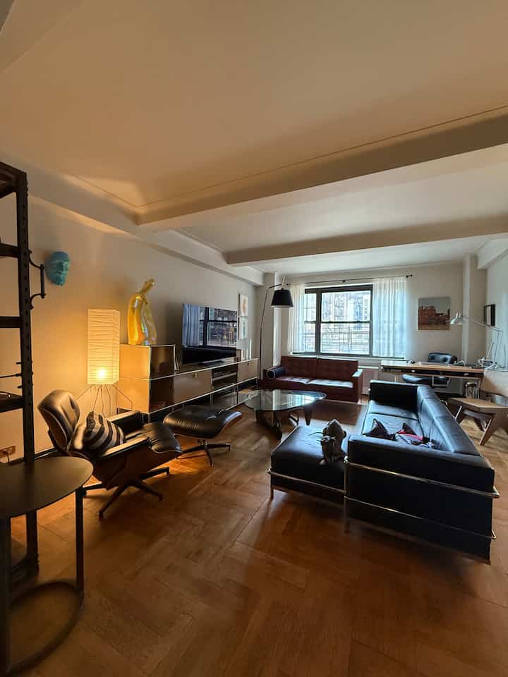 Natural and brown toned living room featuring Mid-Century Modern furniture and classic style in a sophisticated space