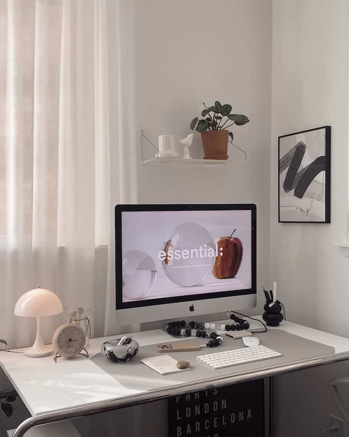 Simple and Cozy desktop set up #desk #deskterrier #desksetup #homeoffice #workspace #deskdecoration #deskinterior #imac #lamp #clock #candle #penholder #cable #poster #posterframe <div><br></div>