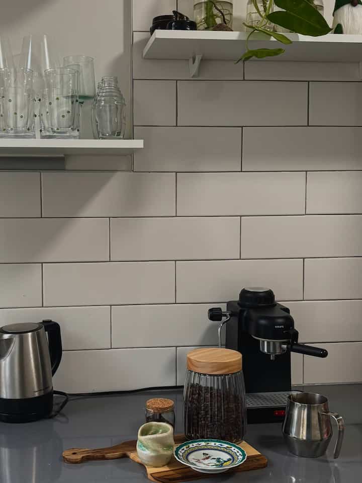 Beverage central. Ft Astro Boy dish 🤍
Sometimes he picks the decor

#kitchen #modern #biophiliac
#kitchenideas #boyandgirlapartment #boygirlpartment