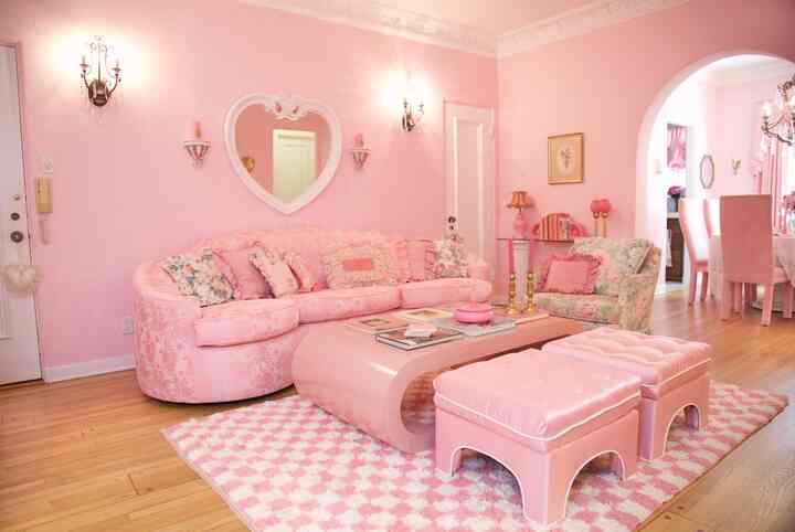 My living room from my first apartment in LA. Whimsical, pink & a little hollywood glam meets shabby chic style. #pink #livingroom #vintage #shabbychic #hollywoodglam 