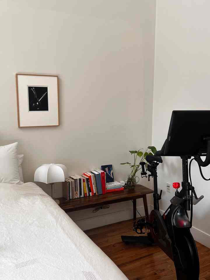 Pile of books that I need to get to reading soon. #bedroom #bedroominterior #bedroomheadwallinterior #bedroomlighting #bedroomstyling #lamp #bench